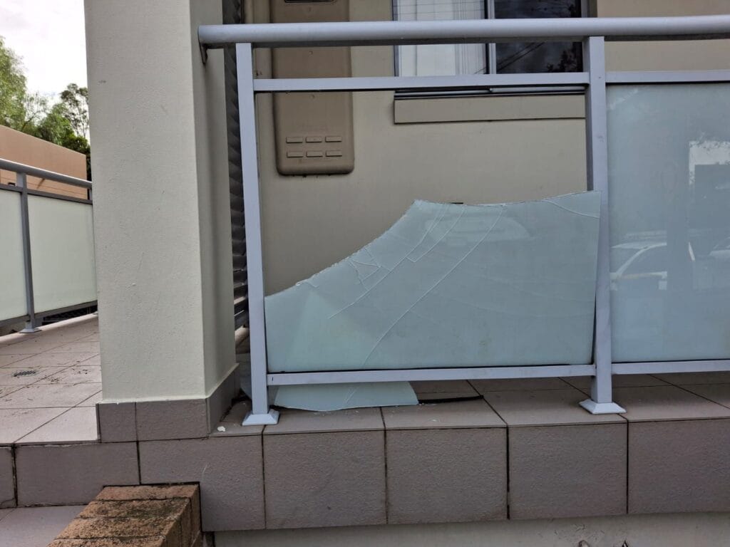 Broken frosted balustrade glass