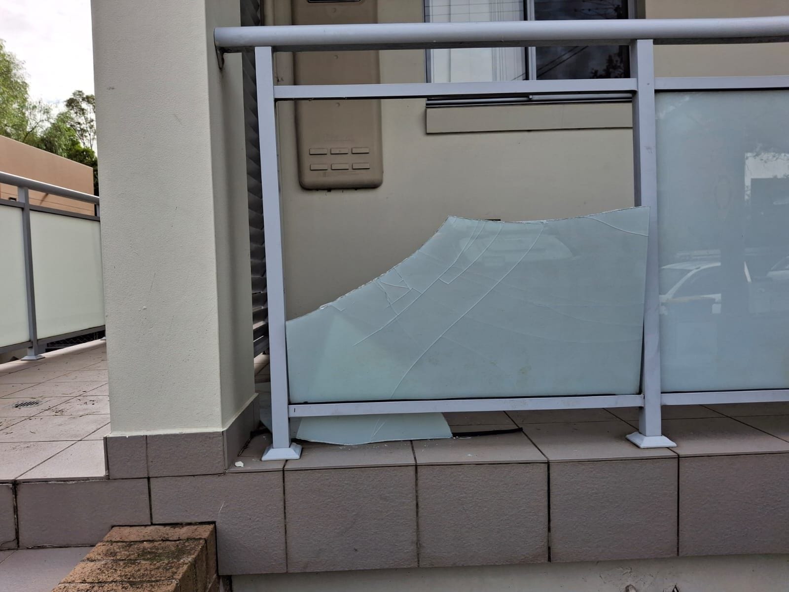 Broken frosted glass balustrade panel