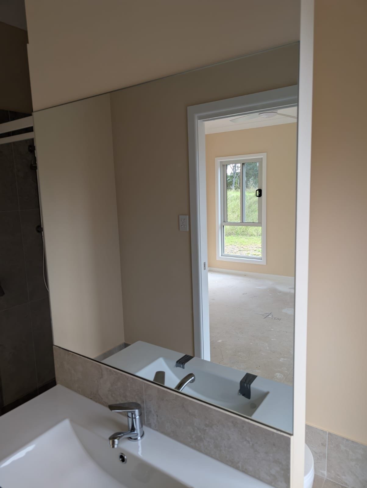 Frameless ensuite vanity mirror