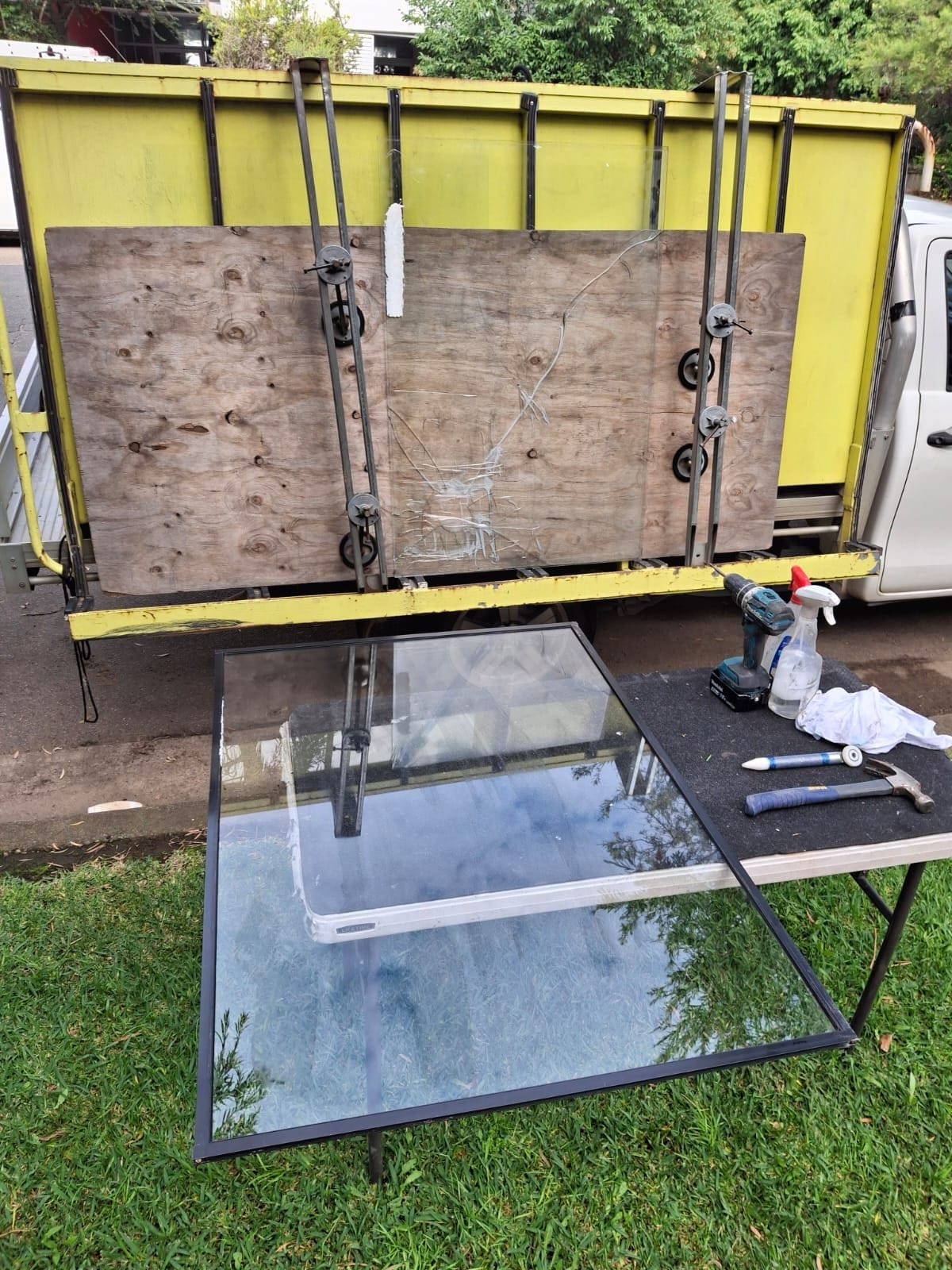 Glazier's truck glass rack and work table on site