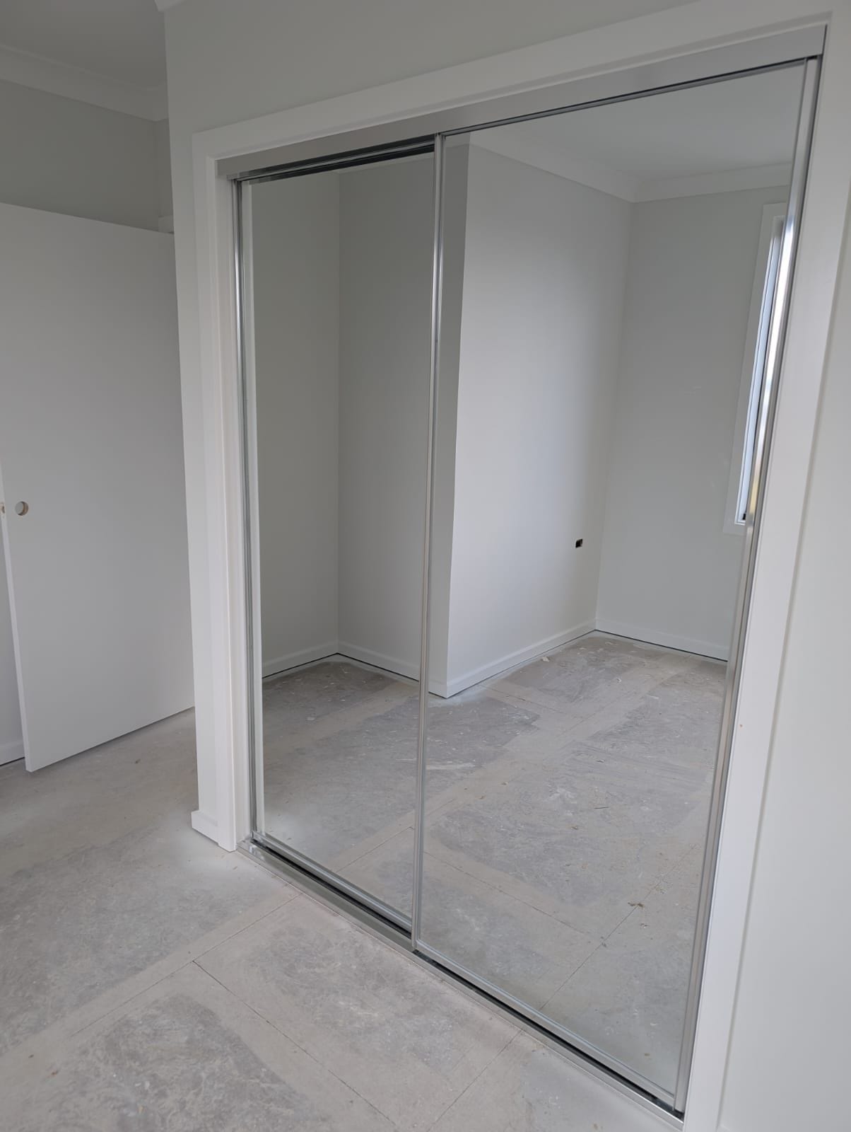Mirror wardrobe doors with silver frames