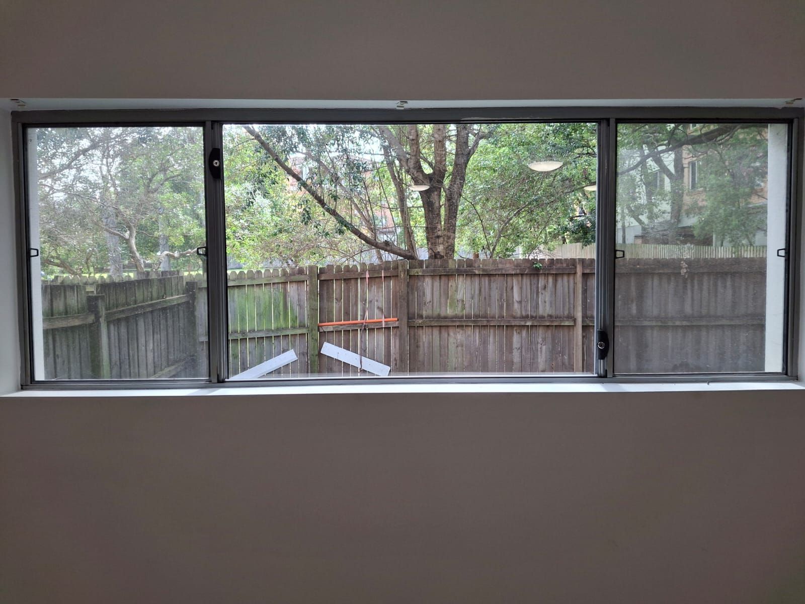 Aluminium sliding window after the glass was replaced