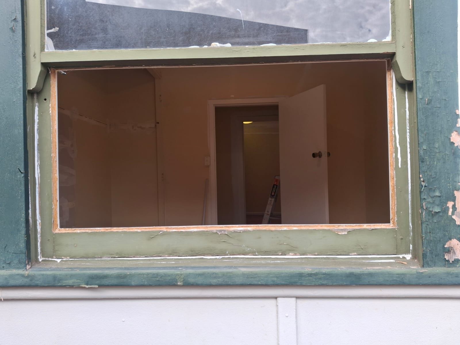 Timber window sash with the broken glass removed